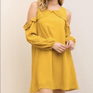 Open shoulder shift dress.